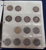 An album of British crowns, halfcrowns, florins and decimal 50 pence and 20 pence coins, including