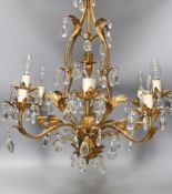 A French gilt metal and cut glass drop eight branch, electrolier58 cms high.