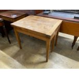 A 19th century French provincial oak farmhouse table with rectangular folding top on square