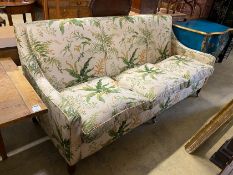 A “Highly Sprung Ltd” Colefax and Fowler fabric three seater sofa with feather cushion seats,