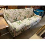 A “Highly Sprung Ltd” Colefax and Fowler fabric three seater sofa with feather cushion seats,