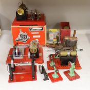 A boxed Mamod twin cylinder stationary engine, and a group of other similar stationary engines and