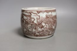 A Chinese iron-red underglaze jar and cover-10 cms high.