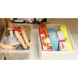 An assortment of miscellaneous boxed toys, two dolls etc,