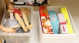 An assortment of miscellaneous boxed toys, two dolls etc,