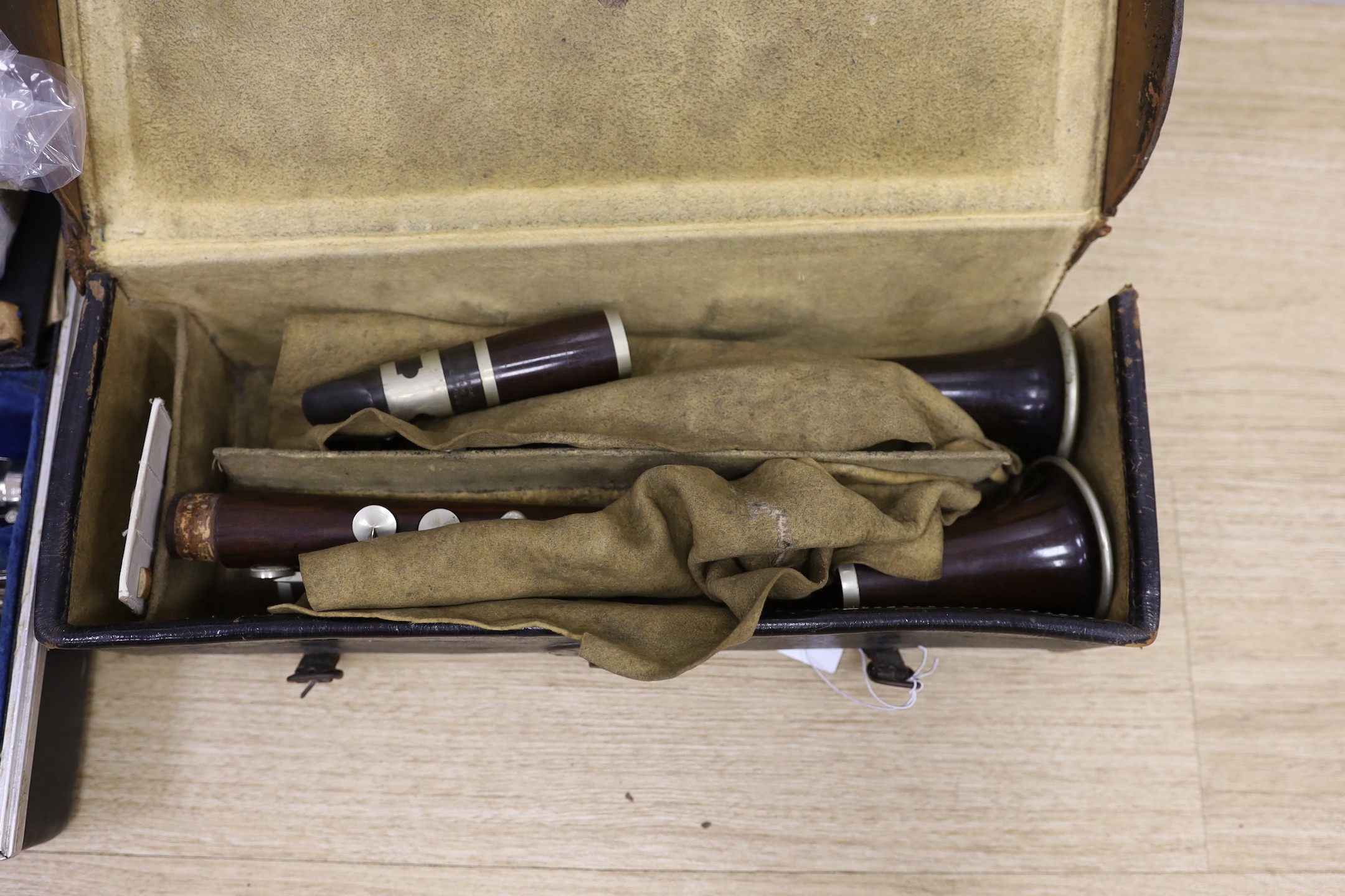 A French Buffet clarinet and two 19th century 'Simple System' clarinets, cased as one - Image 3 of 4