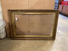 A Victorian rectangular giltwood and gesso picture frame, width 147cm, height 99cm (aperture width