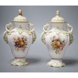 A pair of Copelands London, fruit decorated two handled vases and covers, circa 1900- 20cms high.