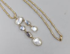 A 375 and six stone cabochon moonstone set drop necklace, with white meta spacers, approx. 60cm,