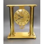 A contemporary Hour Lavigne gilt metal cased quartz mantel clock