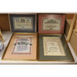 Four framed Share Certificates: one Siberian, two USA and one Spainish.