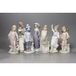 A collection of seven Lladro figures, tallest 22 cm, to include a girl with lamb, a girl with duck