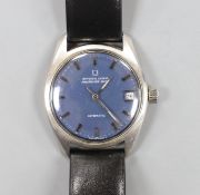 A gentleman's stainless steel Universal Polerouter Date manual wind wrist watch, cased diameter