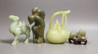 Three Chinese jade or hardstone figures and a bowenite jade wine pot, 12.2cm high (4)