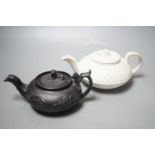 A Wedgwood caneware teapot c.1810 and an English black basalt teapot c.1810