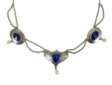A stylish early 20th century sterling, enamel and baroque drop pearl set necklace, with shaped