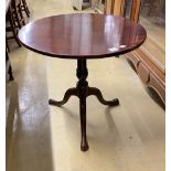 A George III circular mahogany tilt top tripod tea table, diameter 76cm, height 69cm