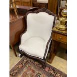 A Victorian carved mahogany armchair, width 70cm, depth 66cm, height 110cm