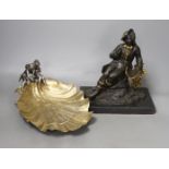 A WMF style plated ‘cherub’ shell dish, and a spelter figure of a seated male reading