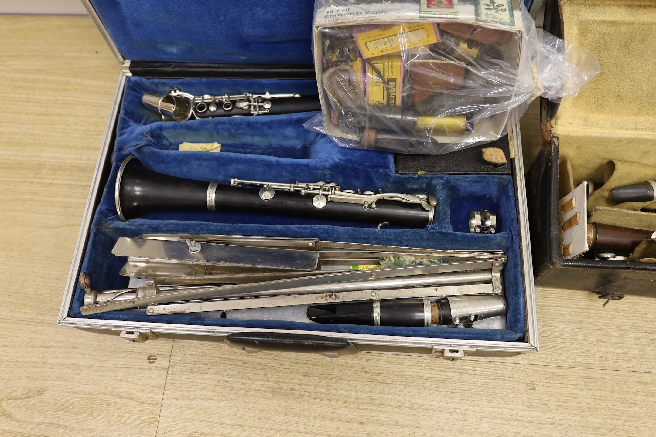 A French Buffet clarinet and two 19th century 'Simple System' clarinets, cased as one - Image 2 of 4