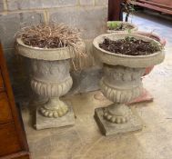 A pair of reconstituted stone campana garden urns, diameter 41cm, height 56cm