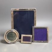 Four assorted silver mounted photograph frames, largest 20.4cm.