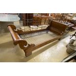 A 19th century Continental carved mahogany single sleigh bed, width 109cm, length 260cm, height