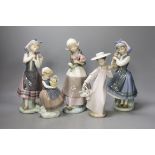 Five Lladro figures to include flower sellers, tallest 26.5 cm (5)