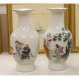 A pair of Chinese famille rose vases,40 cms high.