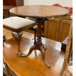 A George III mahogany bird cage tilt top tripod tea table diameter 64cm, height 68cm.