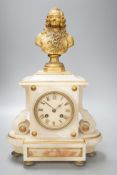 A 19th century French spelter and alabaster mantel clock, 40cm