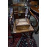 A Regency brass inlaid rosewood cane seat elbow chair together with a Regency brass inlaid work