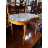 An Edwardian Sheraton revival satinwood dressing stool, width 61cm, depth 40cm, height 67cm**