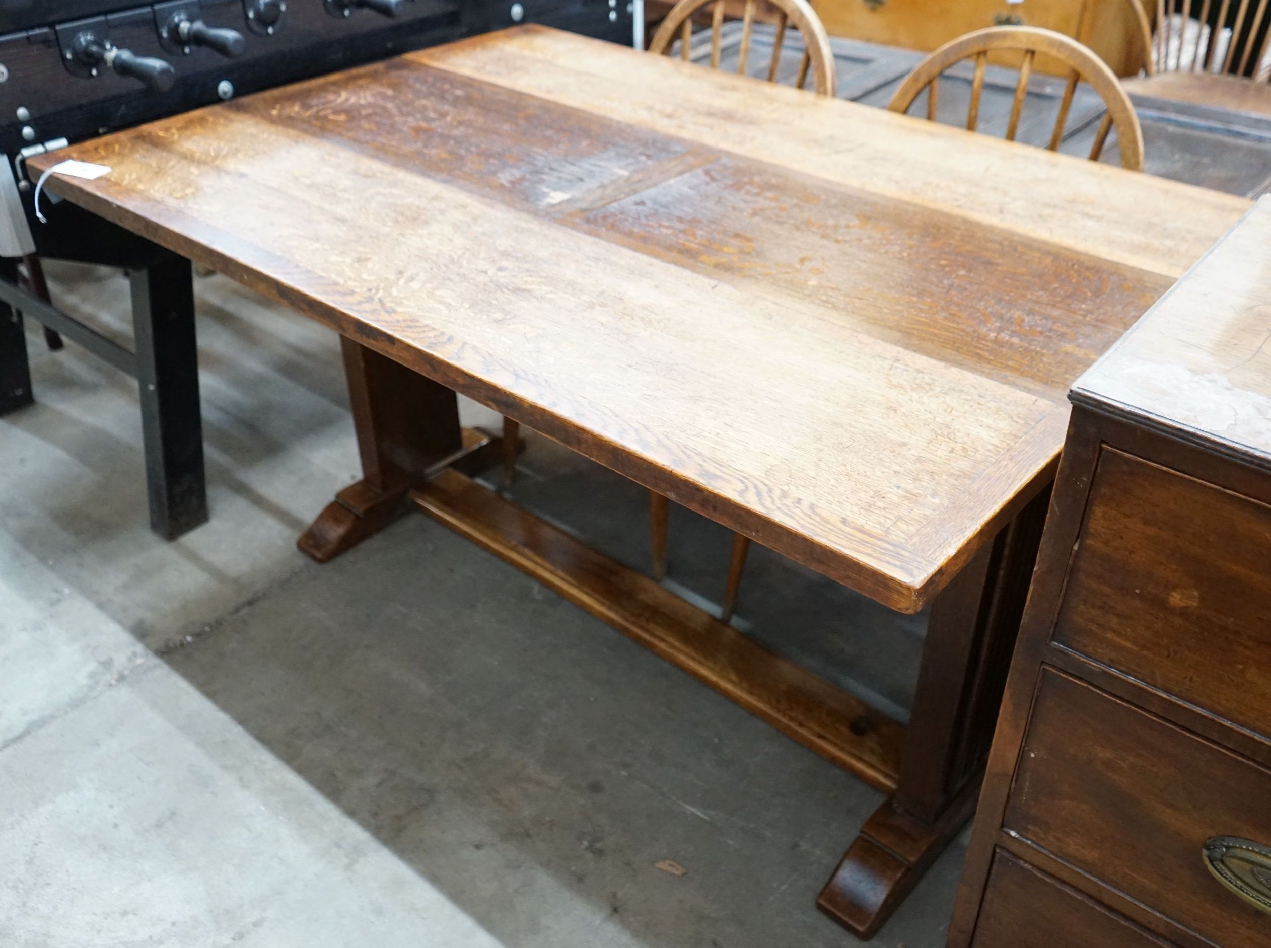 An 18th century style rectangular oak drop leaf extending dining table, depth 136cm, length 94cm