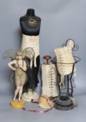 A 1920s/1930s ‘Sanetta’ shop display miniature corset dummy, 59 cm, three miniature corsets, a 1920s