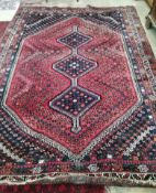 A North West Persian blue and red ground carpet, 290 x 210cm**CONDITION REPORT**PLEASE NOTE:-