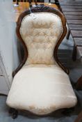 A Victorian walnut upholstered spoon back nursing chair**CONDITION REPORT**Good condition;