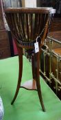 An Edwardian satinwood banded mahogany jardiniere with brass liner, diameter 35cm, height 85cm.**