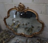 A Victorian carved giltwood shaped oval wall mirror, width 110cm, height 96cm**CONDITION REPORT**