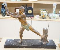 An Art Deco patinated spelter figure of a woodcutter, signed G Hervore, 75cm long**CONDITION