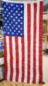 A large USA flag (sewn stars & stripes)**CONDITION REPORT**PLEASE NOTE:- Prospective buyers are