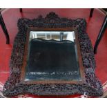 A Chinese rectangular carved hardwood wall mirror, width 52cm, height 64cm**CONDITION REPORT**PLEASE