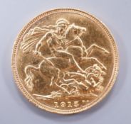 A George V 1915 gold sovereign.**CONDITION REPORT**PLEASE NOTE:- Prospective buyers are strongly