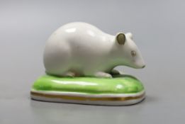 A Derby porcelain figure of a recumbent white mouse, c.1825-35, unmarked, 6.5cmcf. D. G. Rice,