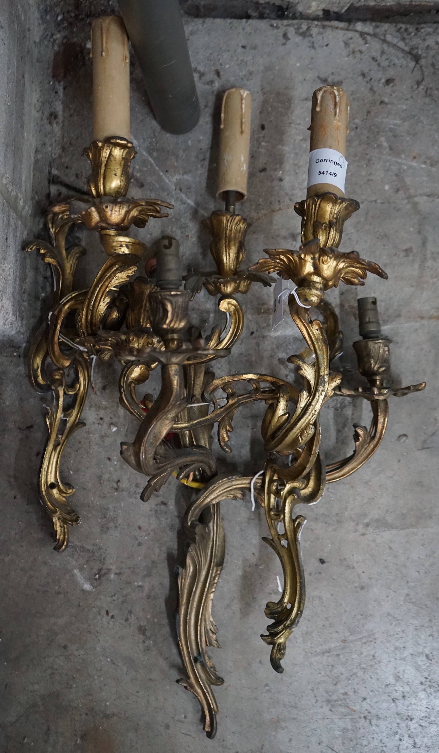 A set of three rococo style gilt metal twin branch wall lights, height 45cm**CONDITION REPORT** - Image 3 of 3