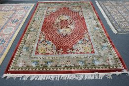 A Canton Chinese silk carpet, 280 x 186cm**CONDITION REPORT**PLEASE NOTE:- Prospective buyers are