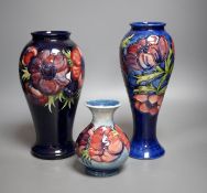 Three William Moorcroft anemone pattern vases, tallest 27cm**CONDITION REPORT**PLEASE NOTE:-