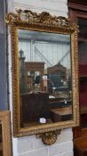 An 18th century style giltwood wall mirror, width 57cm, height 94cm**CONDITION REPORT**PLEASE NOTE:-