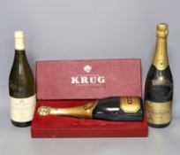 One bottle of Bollinger vintage champagne, 1989, one boxed bottle of Krug (NV) and a bottle of