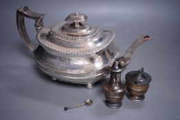 A Georgian silver teapot, (marks rubbed and repaired) and two Edwardian silver condiments, gross